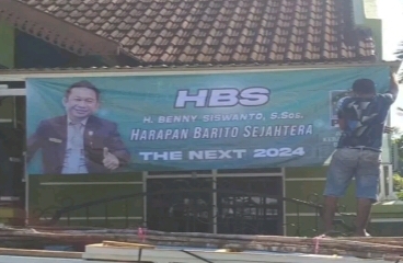 Salah satu baliho Benny Siswanto di sudut Muara Teweh.(ist) 
