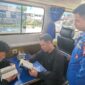 Ditpolairud Polda Kalteng KP XVIII-2007 mendampingi anak-anak pesisir manambah ilmu di Pondok Baca Melek Huruf (PBMH) di Kabupaten Kapuas, Sabtu, 11 Juli 2026 siang.(Foto/KP XVIII-2007 Ditpolairud Polda Kalteng) 